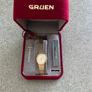 Vintage Gruen gold watch. Comes with box.